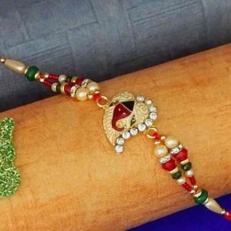 Golden Metal Ganesha Rakhi Golden Metal Ganesha Rakhi