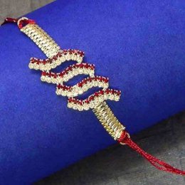 Artificial White Metal & Diamond Rakhi Artificial White Metal & Diamond Rakhi