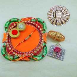 Multi Colored Rakhi Thali with Kaju Rolls 200grm. - USA Delivery Multi Colored Rakhi Thali with Kaju Rolls 200grm. - USA Delivery