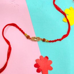 One Rudraksh Designer Rakhi - USA Delivery Direct One Rudraksh Designer Rakhi - USA Delivery Direct