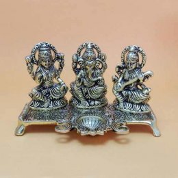 White Metal Lord Ganesh With Goddess Lakshmi & Saraswati White Metal Lord Ganesh With Goddess Lakshmi & Saraswati